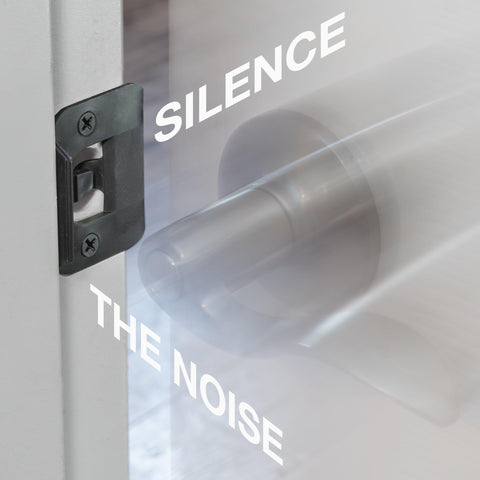 BrainExploder door silencer strike plate demonstrates easy no-mod installation on existing doors.
