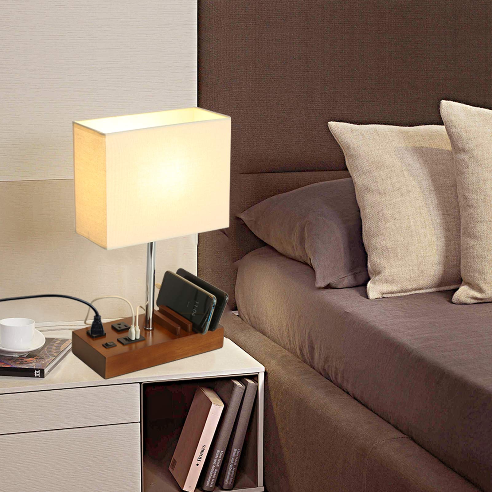 Briever table lamp saves space on a nightstand with tidy base.