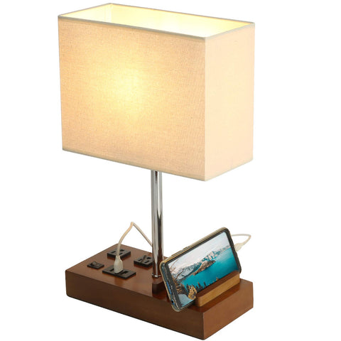 Briever lamp features solid wood station with natural texture.