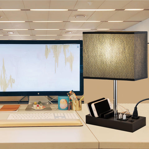 Briever lamp features wooden phone stand on solid wood base.