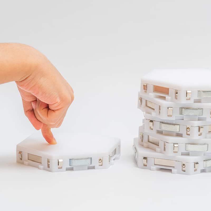 Bright Autism Tap-Tap magnets encourage tactile construction in a cozy sensory corner.