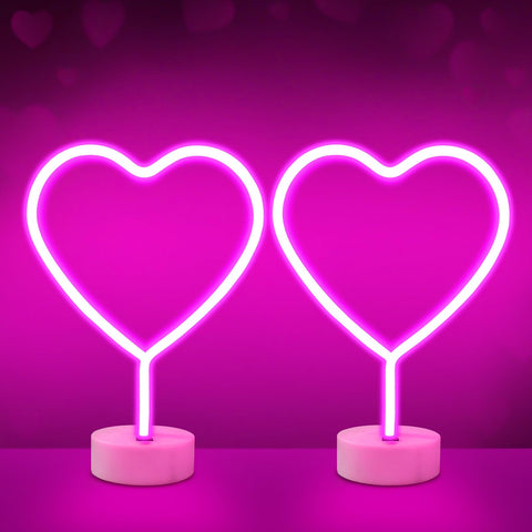 BRIGHTDECK pink heart neon sign closeup with soft ambient glow.