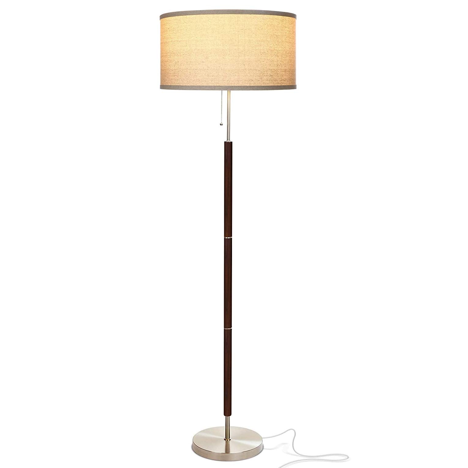 Brightech Carter floor lamp with walnut stem offering ambient warmth for living rooms.