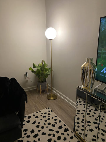Brightech Luna reading setup provides soft illumination for tasks.