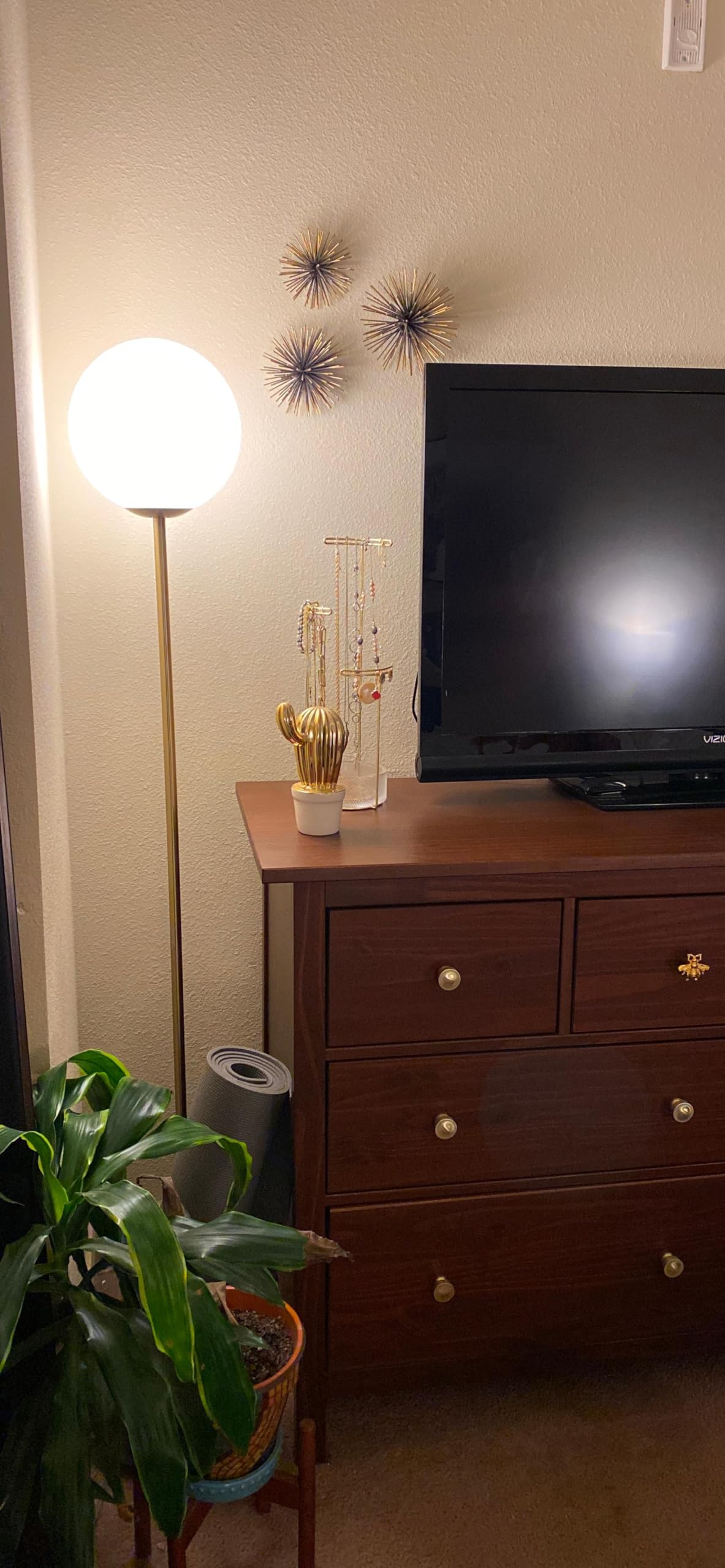 Brightech Luna frosted globe adds mid-century charm to rooms.