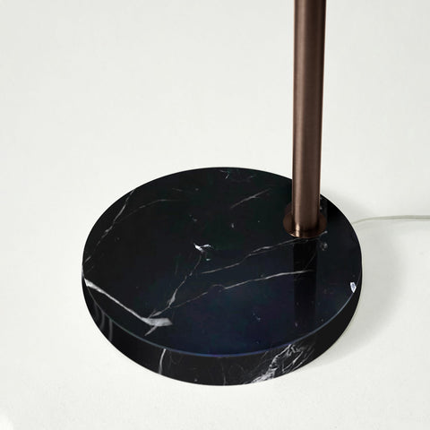 Brightech Mason Arc Lamp curved arc offers overhead reading light.