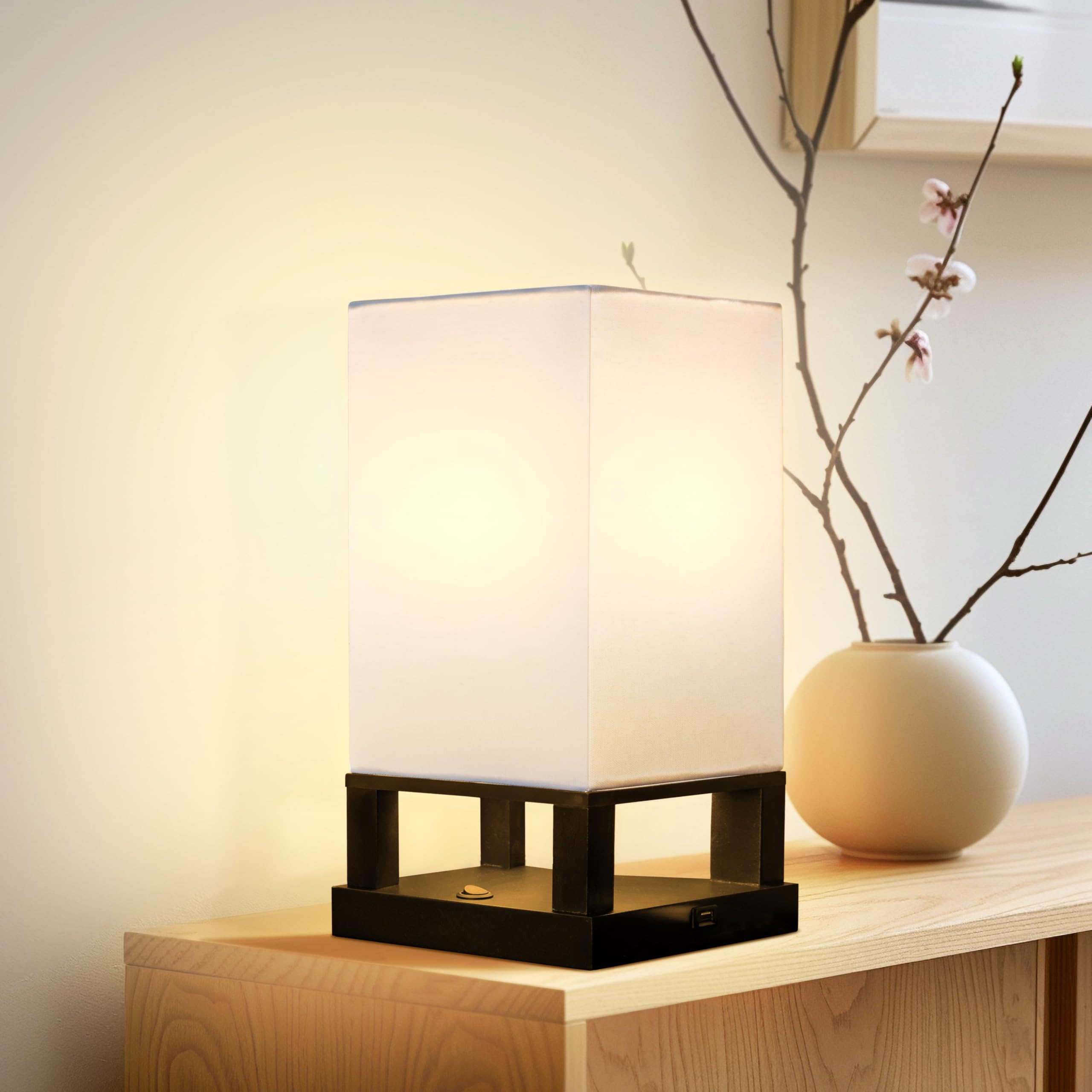 Brightech Maxwell lamp with warm wood frame for a modern Asian-inspired bedside look