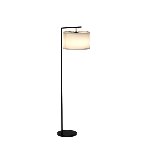 Brightech Montage black floor lamp base anchors a corner