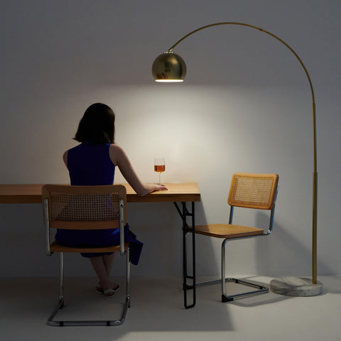 Olivia dome shade directs warm light for reading