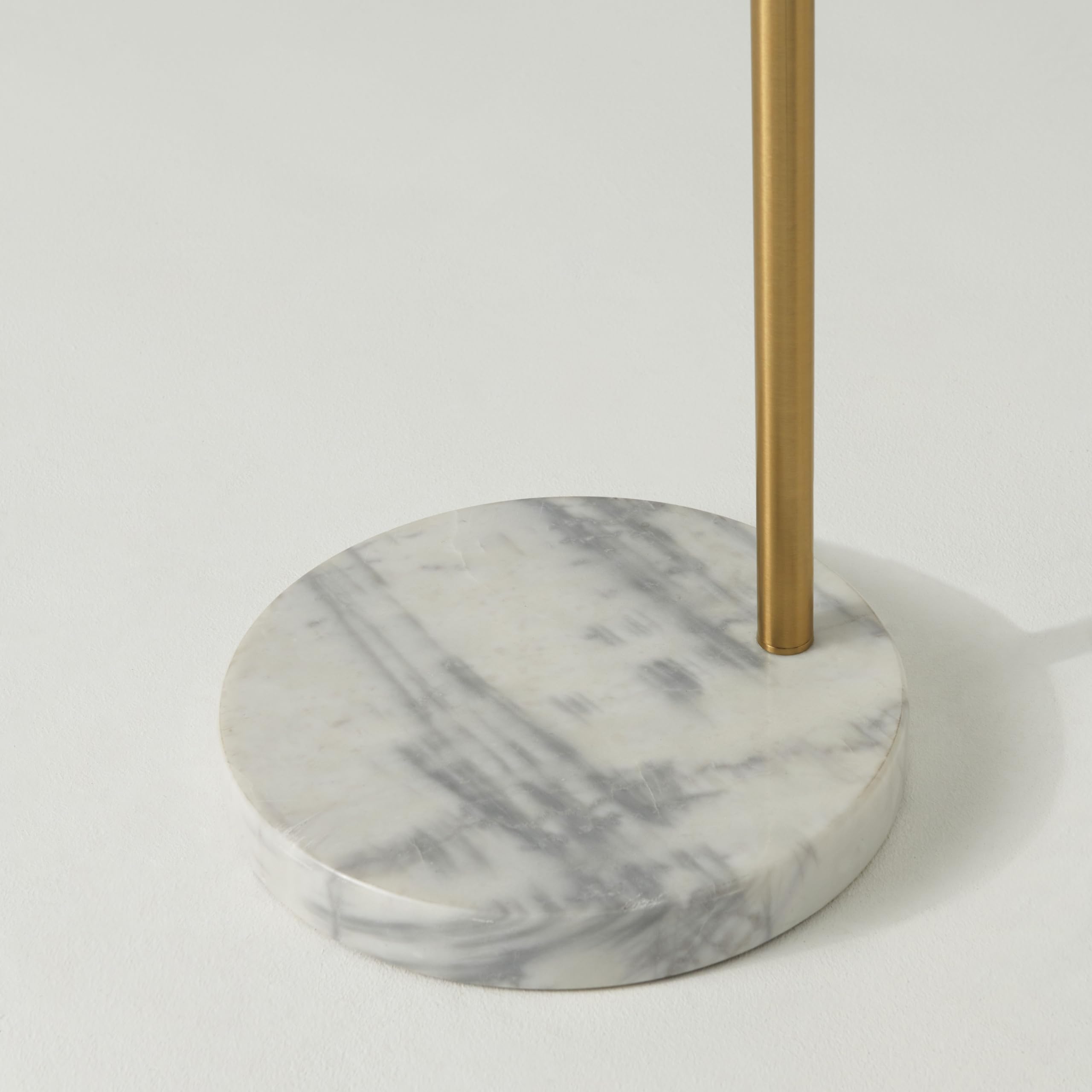 Olivia lamp head rotates to illuminate desired area