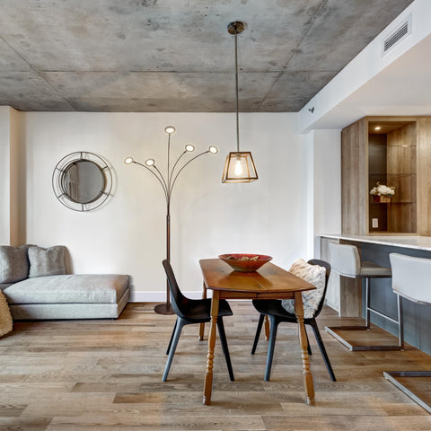 Weighted base of Brightech Orion Arc Lamp offers stability for busy rooms
