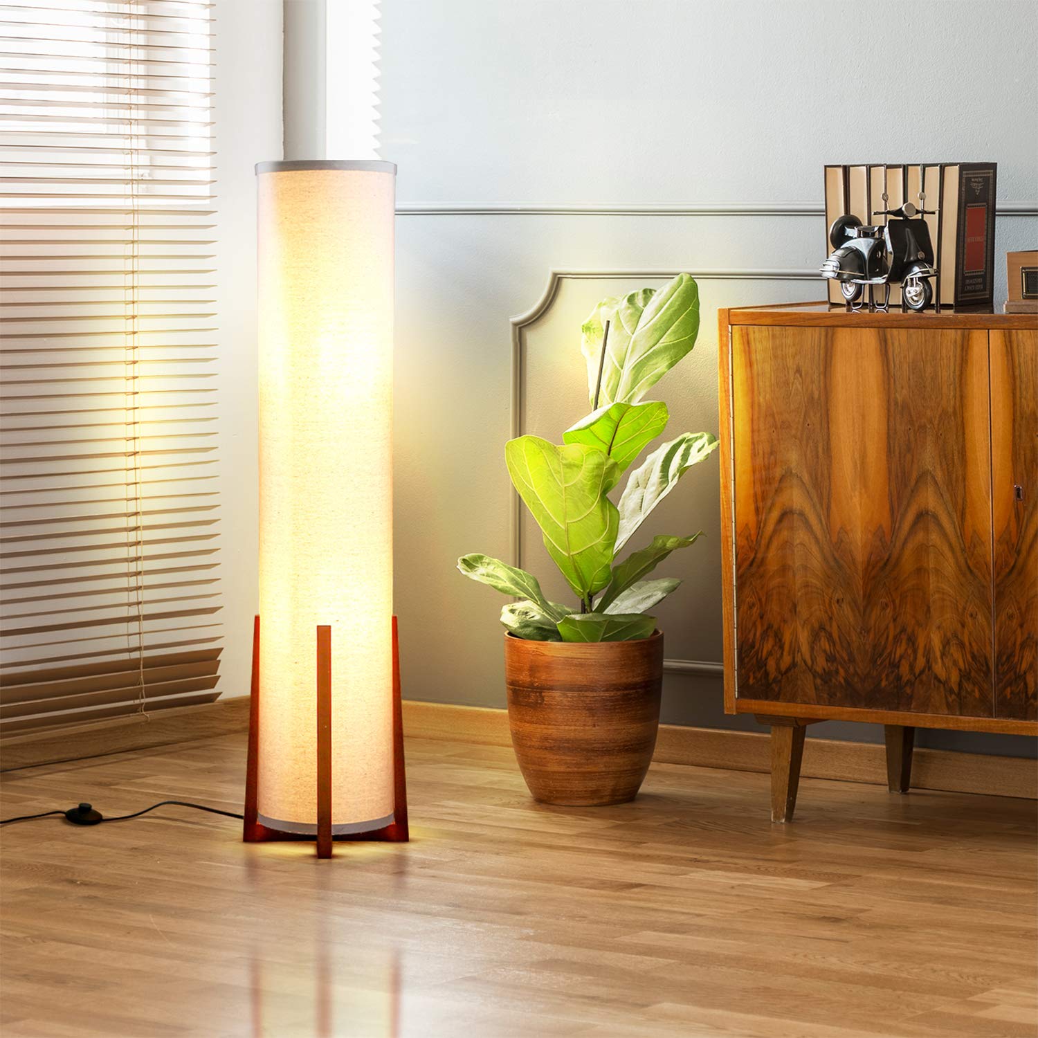 Brightech Parker in a bedroom provides gentle task lighting for reading