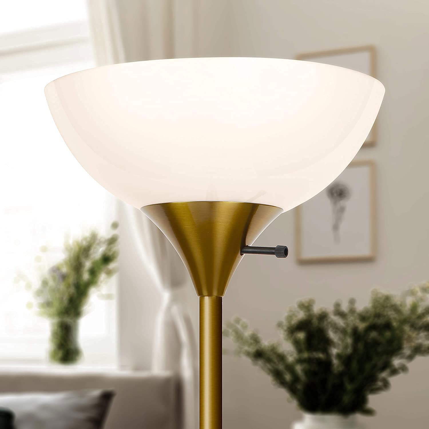 Brightech Sky Dome white dome shade diffuses light to reduce glare.