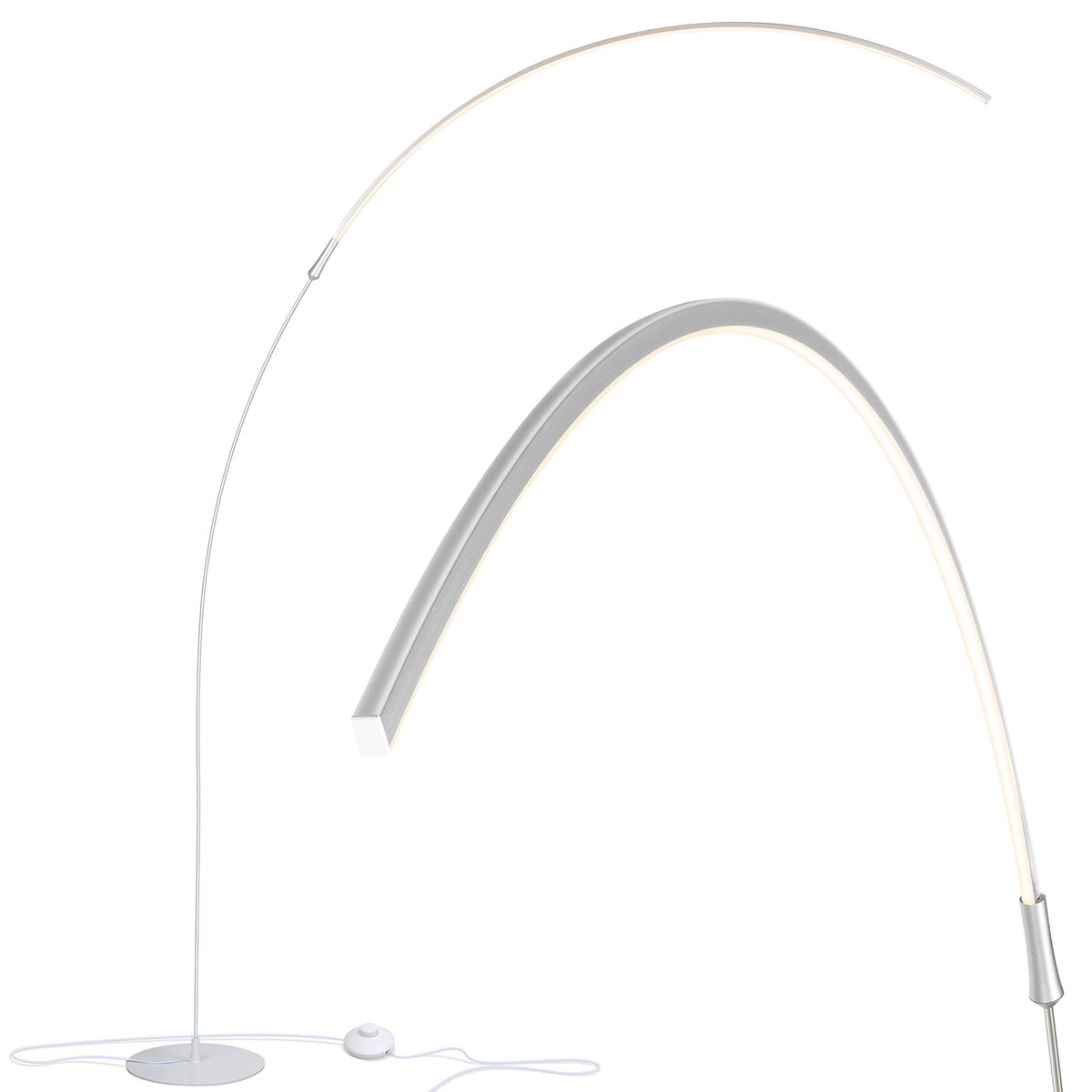 Brightech Sparq Arc floor lamp arches over a desk providing focused task lighting