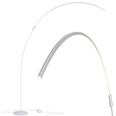 Brightech Sparq Arc floor lamp arches over a desk providing focused task lighting
