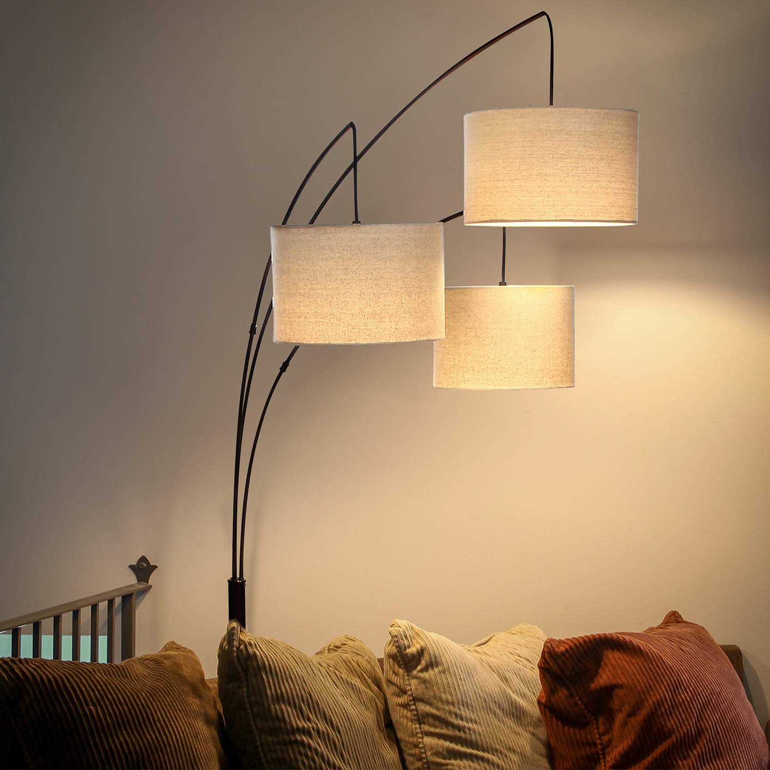 Brightech Trilage Arc lamp complements traditional living room decor.