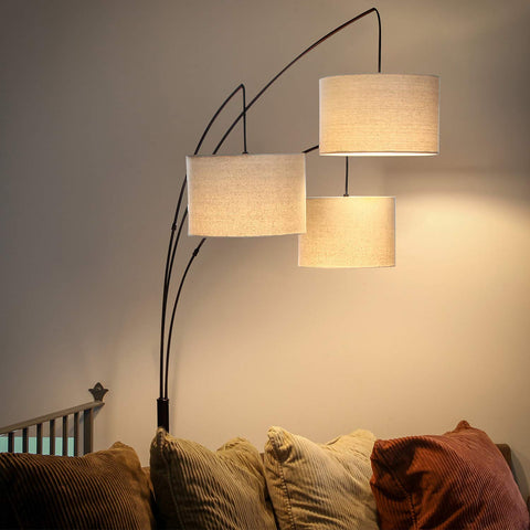 Brightech Trilage Arc lamp complements traditional living room decor.