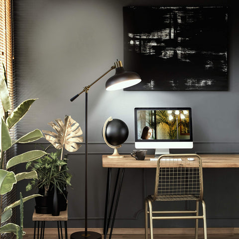 Brightech Wyatt height-adjustable lamp adapts from 42 to 57 inches.