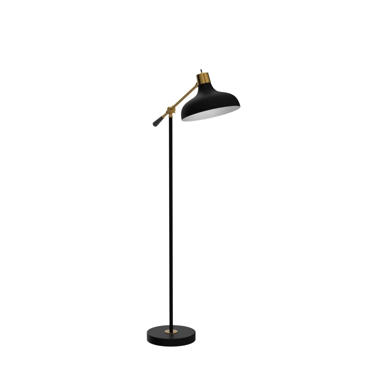 Brightech Wyatt illuminates a reading nook near chairs and desks.