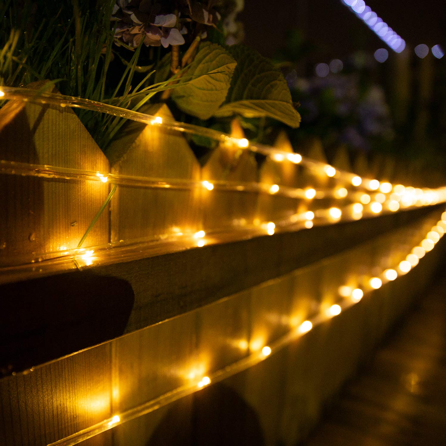Brightown lights wrap around a pergola for magical night scenes