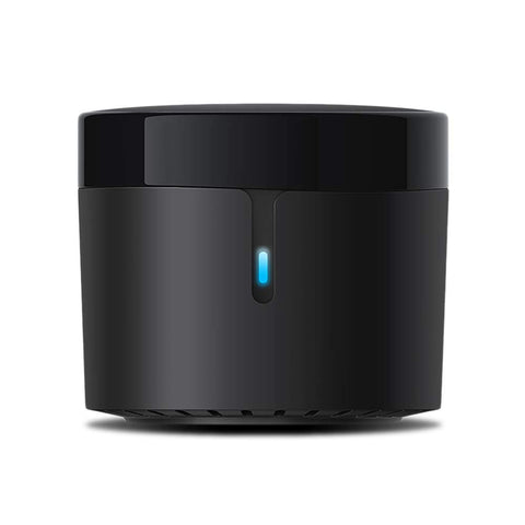 BroadLink RM4 Mini on table enables IR control for TV and AC.