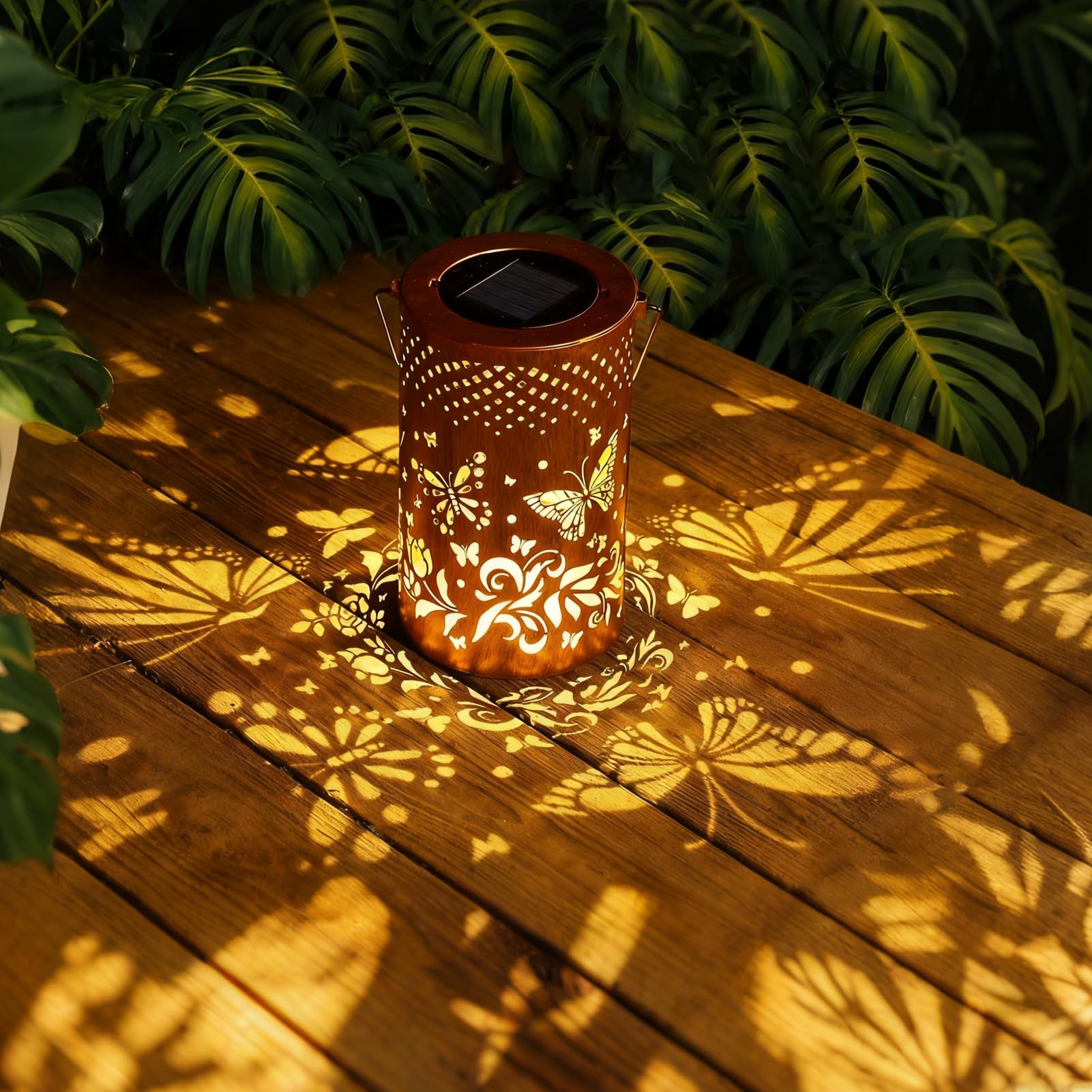 BSGlobal butterfly flowers cutouts illuminate patios at night.