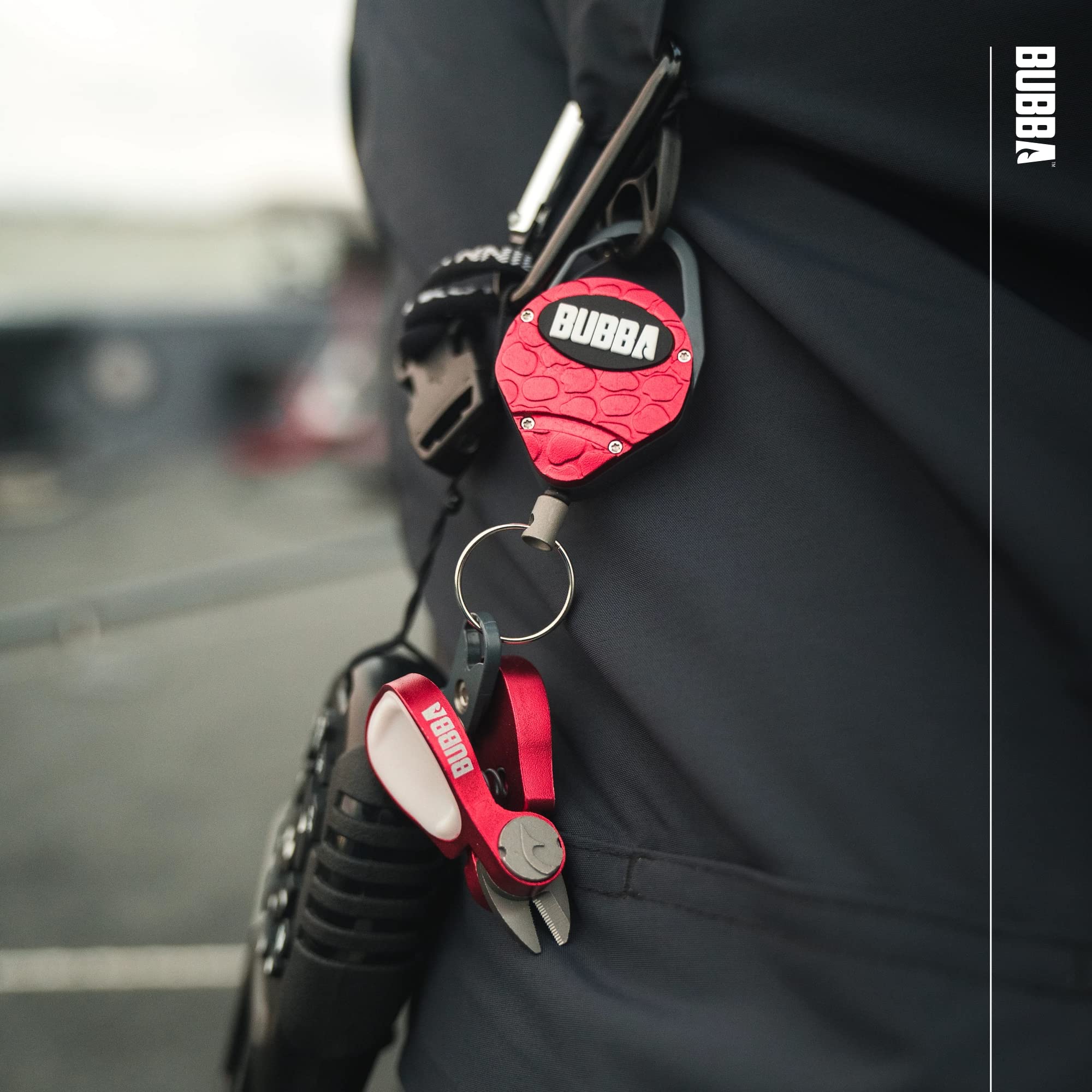 BUBBA Line Clipper Combo tether clipped to pocket for quick access
