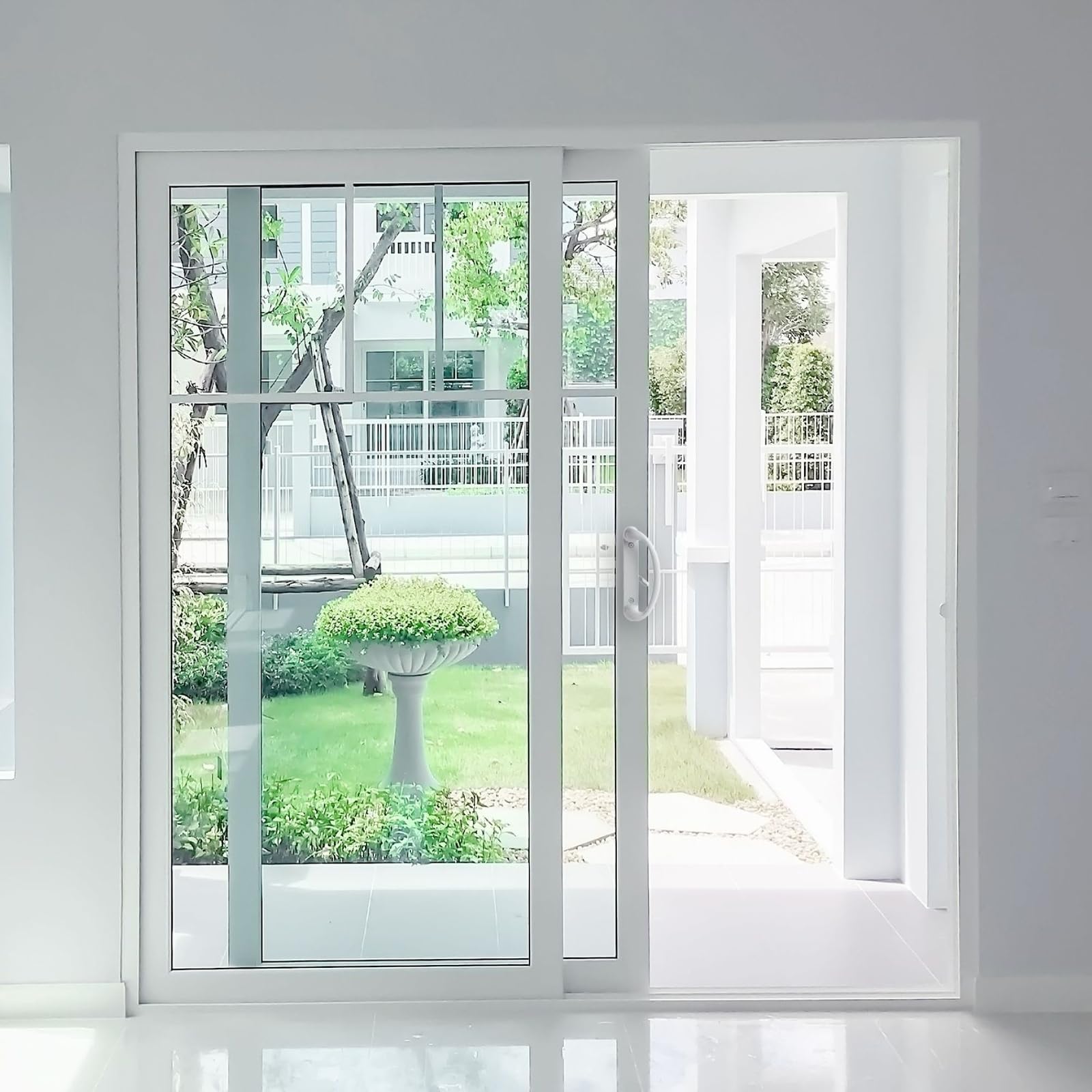 Built Industrial exterior installation of sliding door handle on patio door.