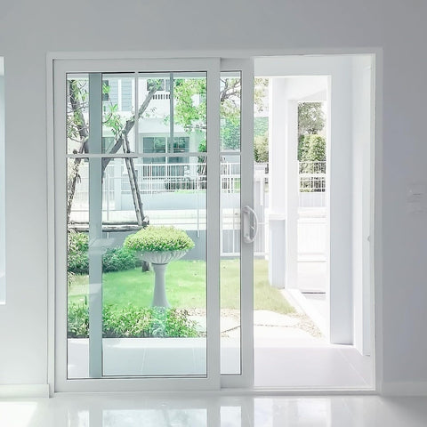 Built Industrial exterior installation of sliding door handle on patio door.