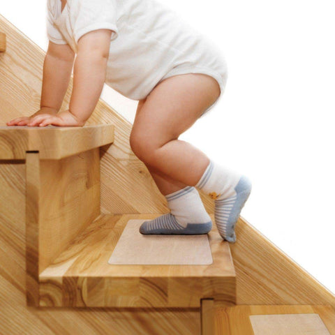 Butizone clear 6x24 stair treads boost grip on wooden stairs.