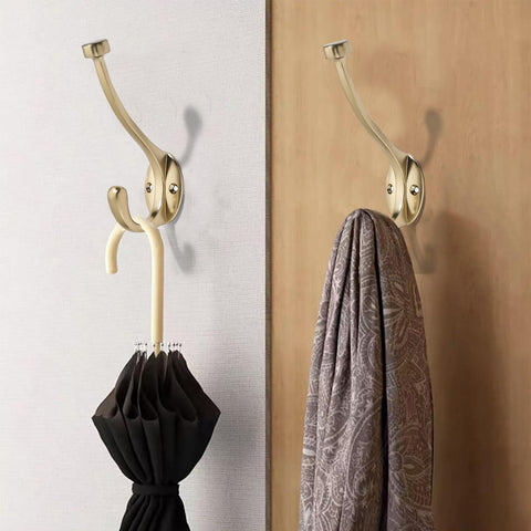 CABDM champagne bronze towel robe hooks mounted on wall provide elegant, durable towel storage.