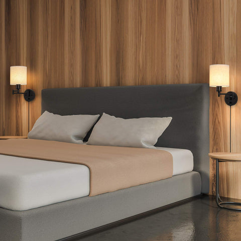 CADUKE linen lampshade wall sconce creates a soft warm glow for reading.