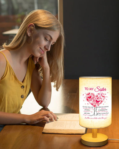 Calibron sister gifts table lamp with fabric lampshade creates cozy reading corners.