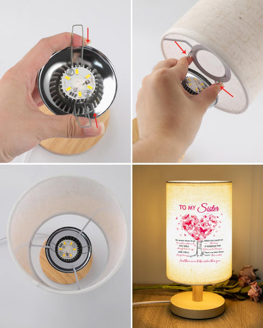 Calibron table lamp USB charging port keeps devices powered.