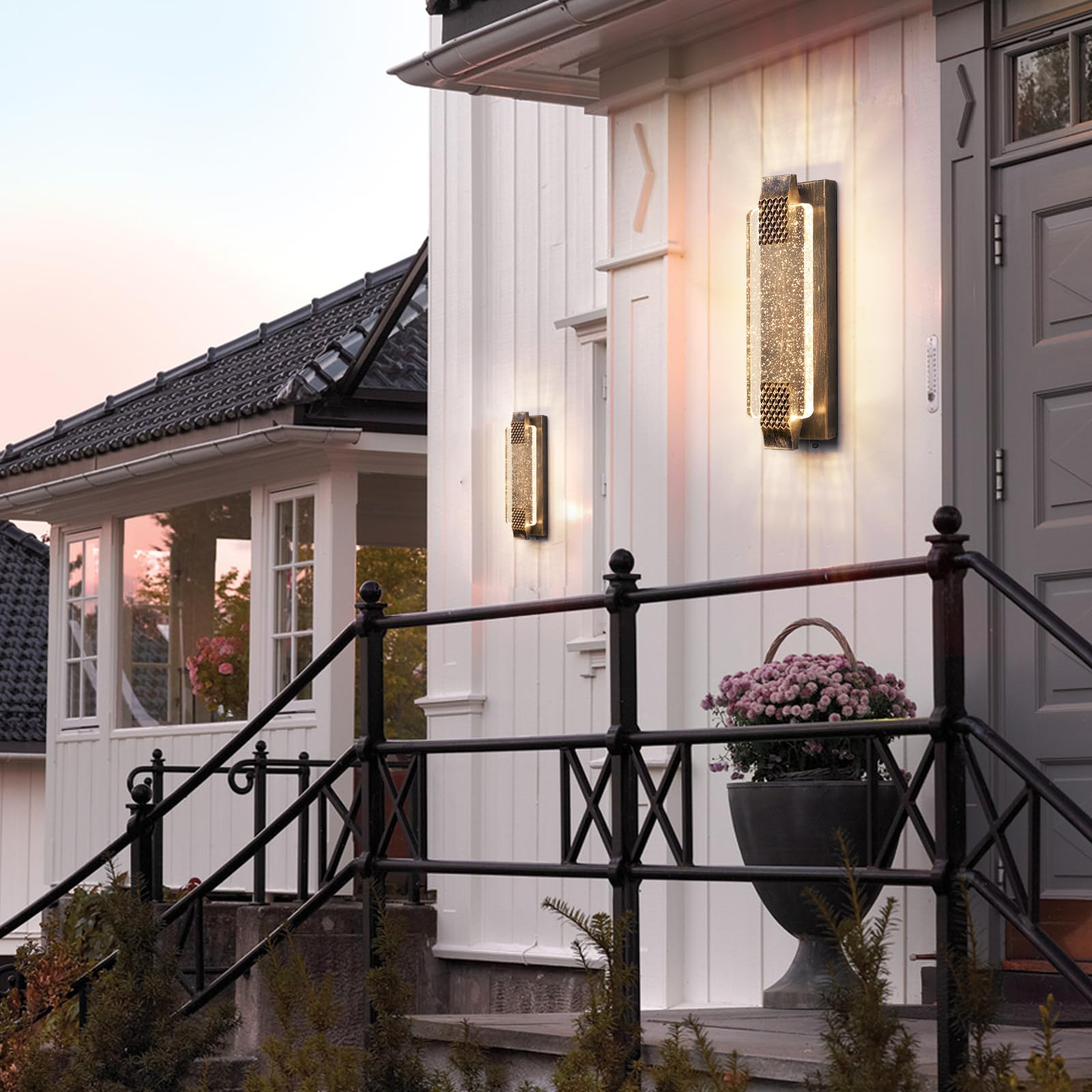 Camuucci bronze finish outdoor sconce adds modern curb appeal.