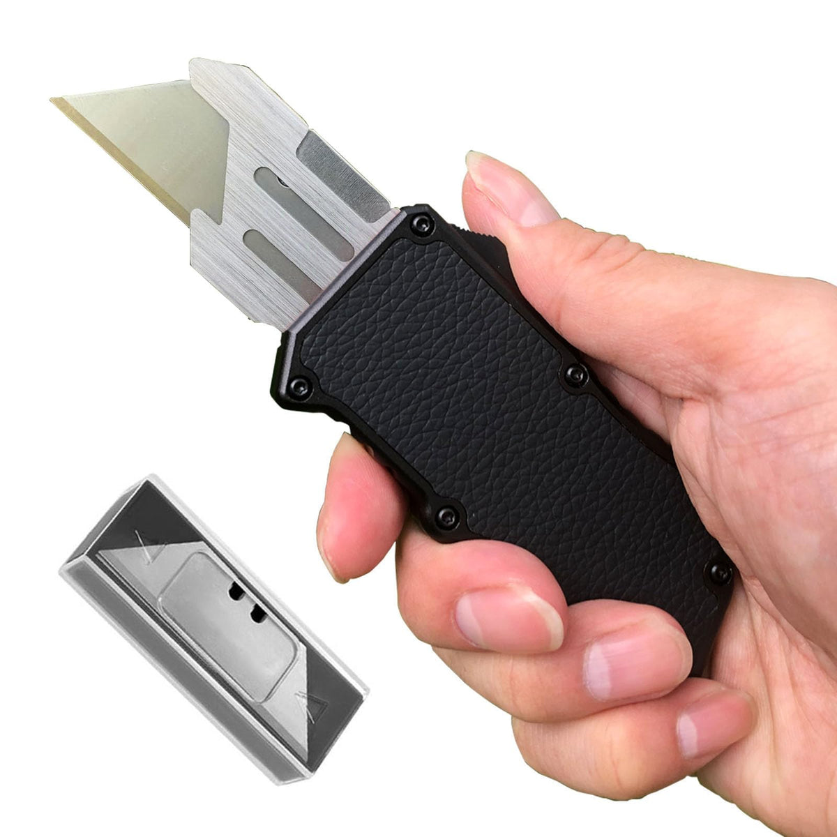 Caressolove automatic knife with black body for safe, one-handed cutting.