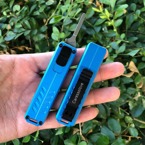 Caressolove push-button knife compact for pocket-ready convenience.