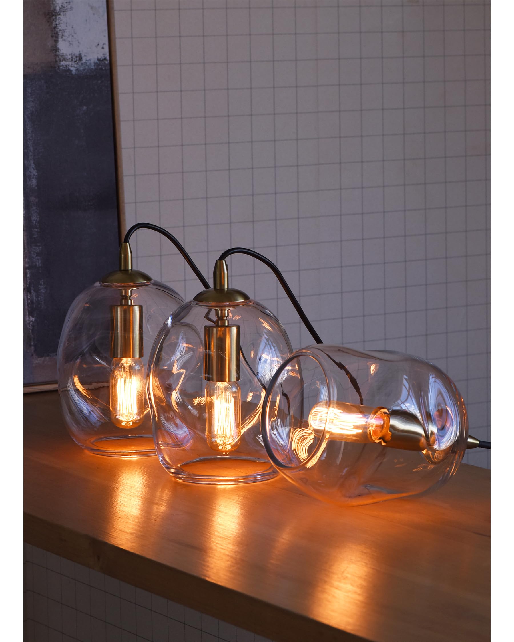 CASAMOTION 8 inch glass pendant provides balanced proportions for compact layouts.