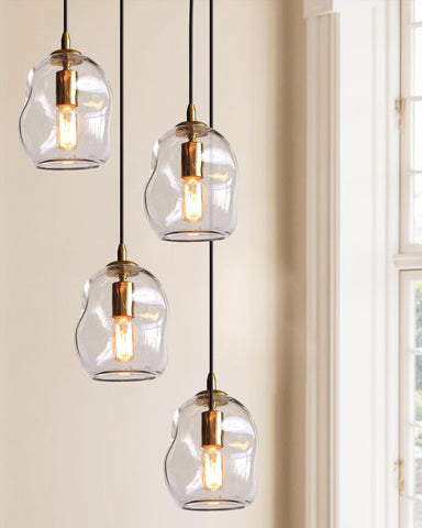 Casamotion dining room pendant light featuring brass hardware for modern tables