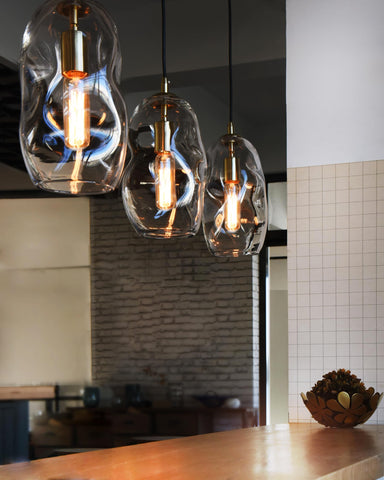 Casamotion dining room pendant highlights meals with warm ambience.