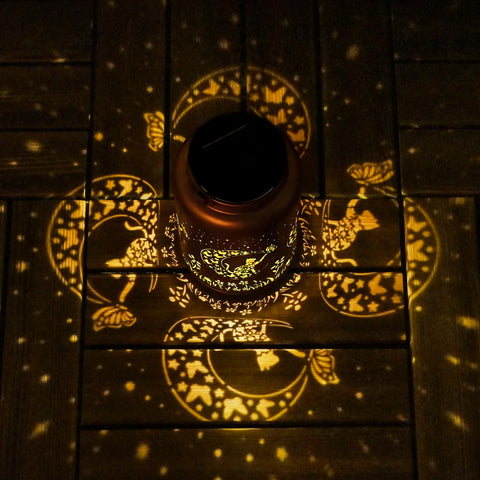 Cawalap Cat Solar Lantern on a tabletop for outdoor décor