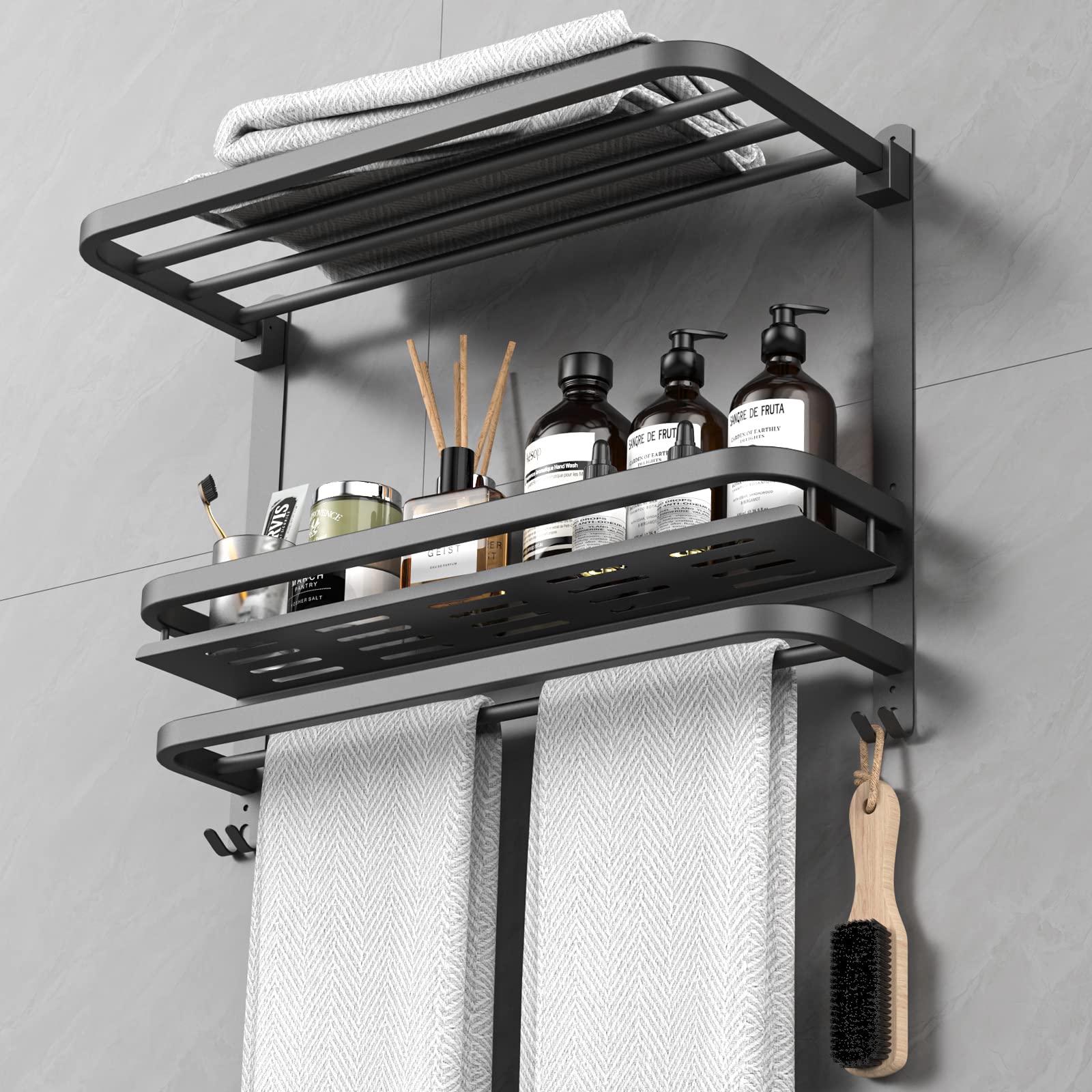 CAXIMSY collapsible black towel rack wall mount for compact bathrooms.