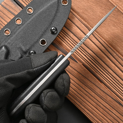 CCFFCC FF101 fixed blade in sheath ready for outdoor tasks.