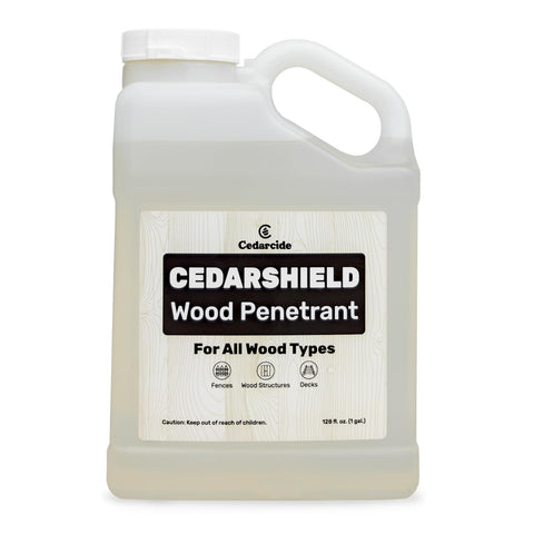 Cedarcide Cedarshield bottle poured onto wood for moisture protection.