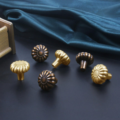 CEYMIO antique brass floral knob highlights a kitchen cabinet update