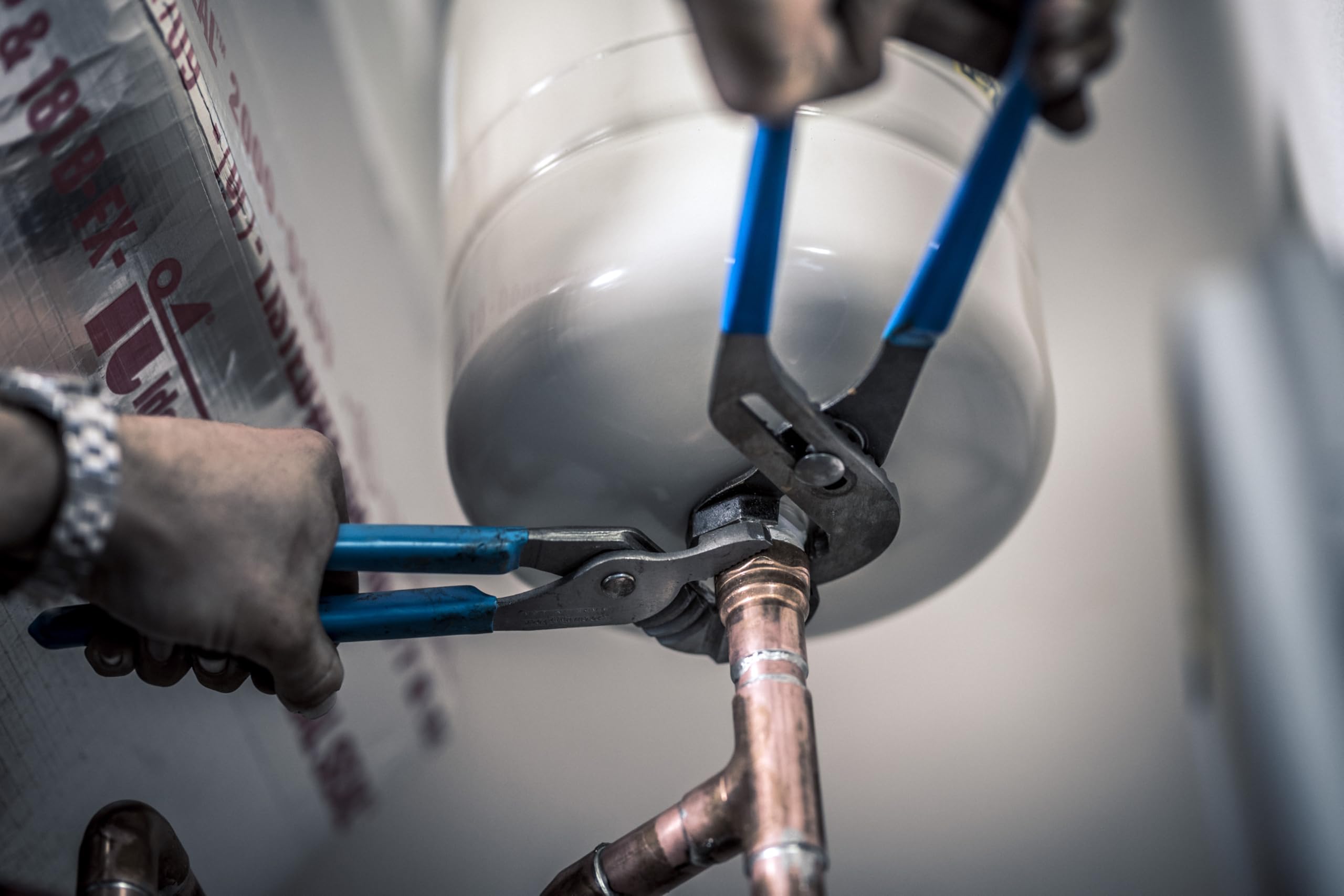 Channellock 442 in use on irregular shapes demonstrates versatile grip.
