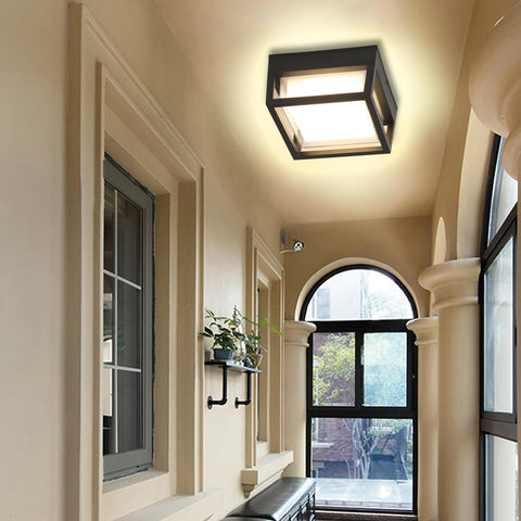 CHENS01 square porch light with black frame enhances curb appeal.