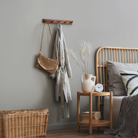 Chiumay teak wall hooks in humid bathroom with water resistant finish.