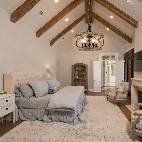 Chords Attic wood chandelier elevates dining room decor with round finial detail.