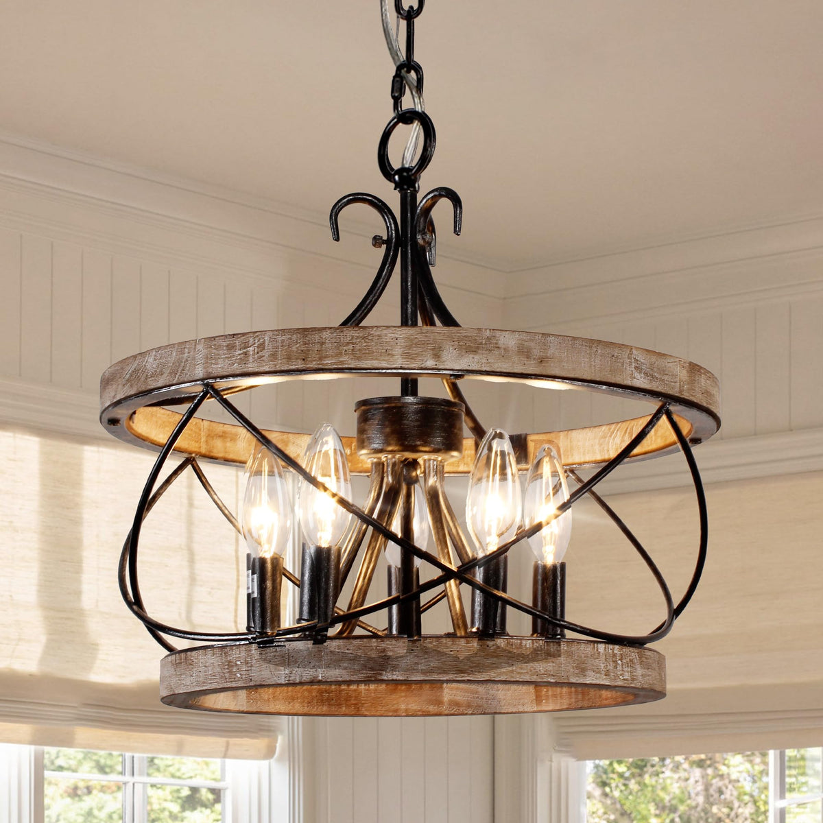 Chords Attic 20-inch wood drum chandelier over dining table adds warm farmhouse ambience.